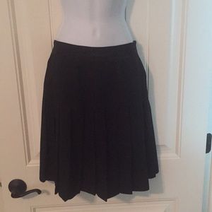 Black pleated skirt. 21.5”